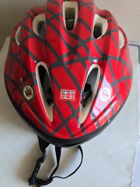 Youth Red Patterned Bike Helmet with Adjustable Strap